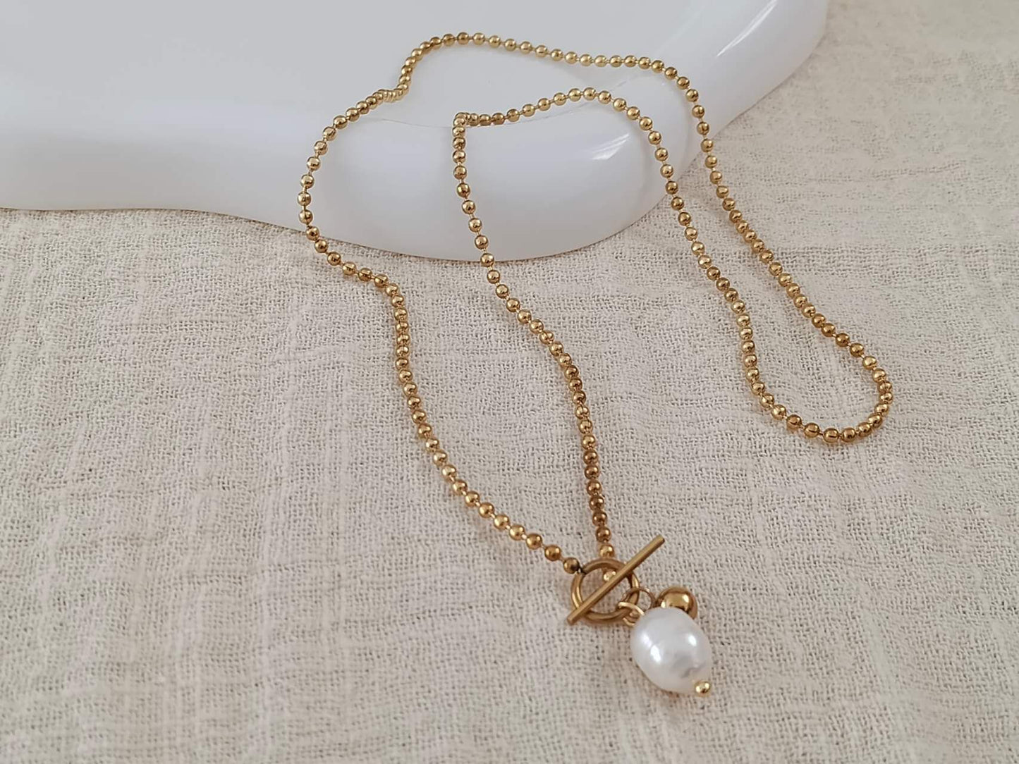 Collier double chaîne perle fermoir T-bar acier doré PVD 18K: Modelo 1