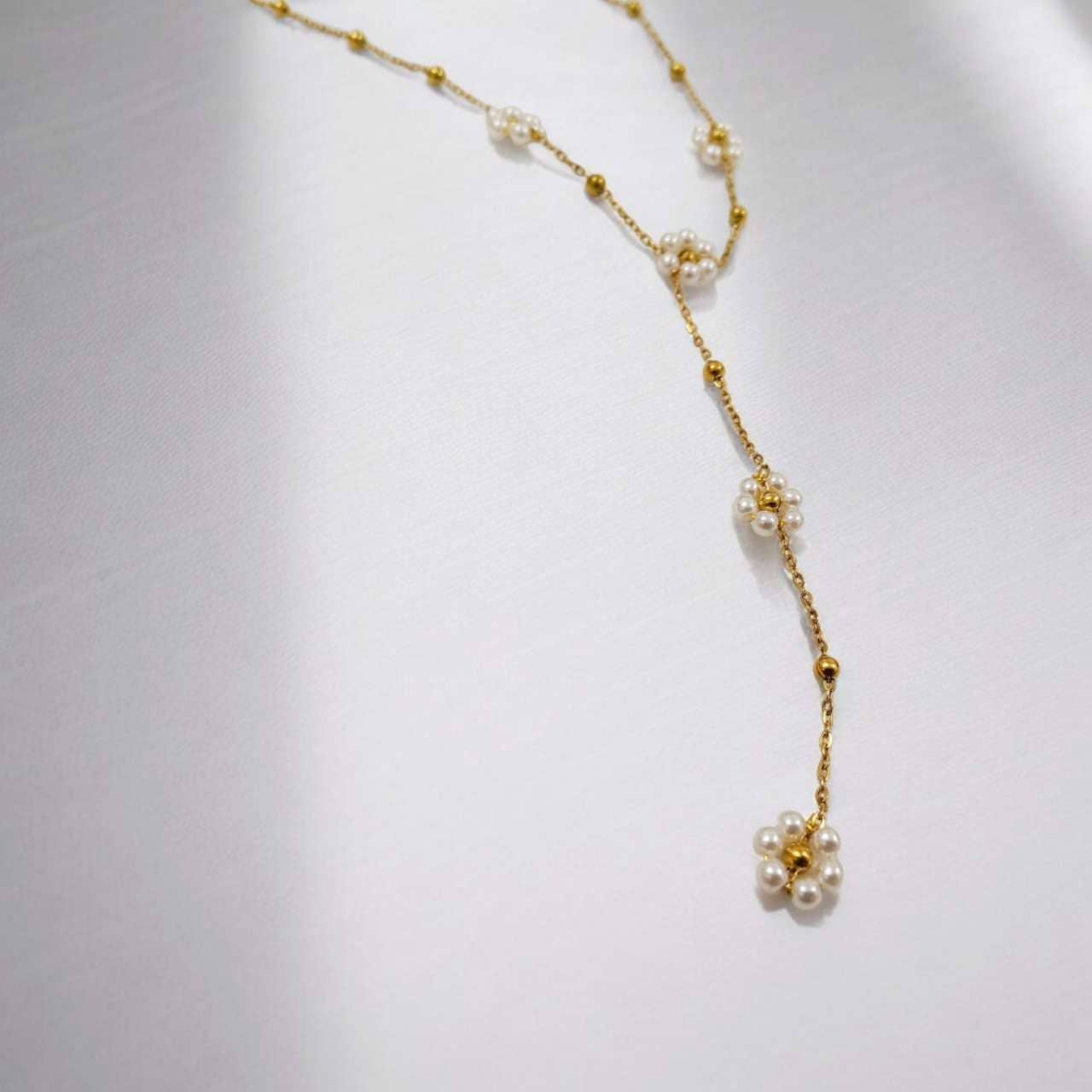 Collier en Y à fleurs et boules