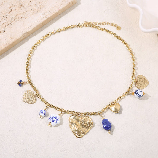 Collier coeur  chaîne dorée pendentifs bleus grande plaque