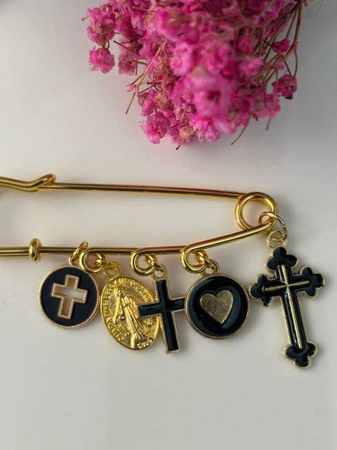 broche croix médaille religieuse noir