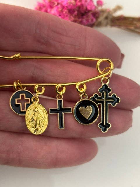 broche croix médaille religieuse noir
