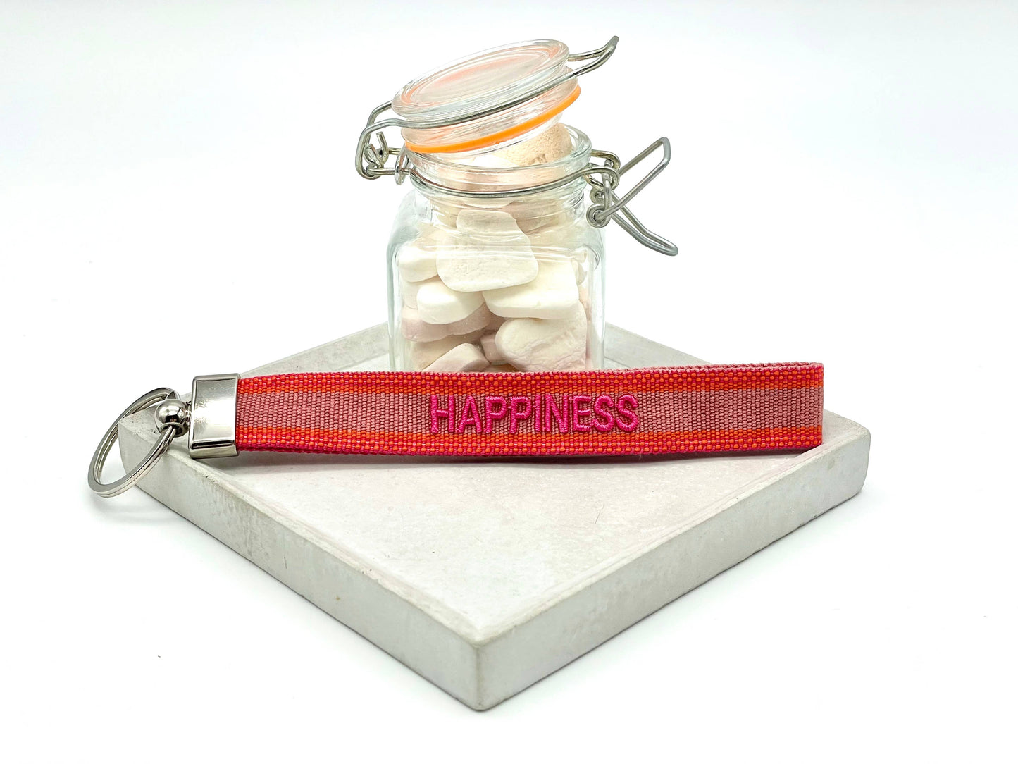 Porte-clés brodé « HAPPINESS » en tissu tissé